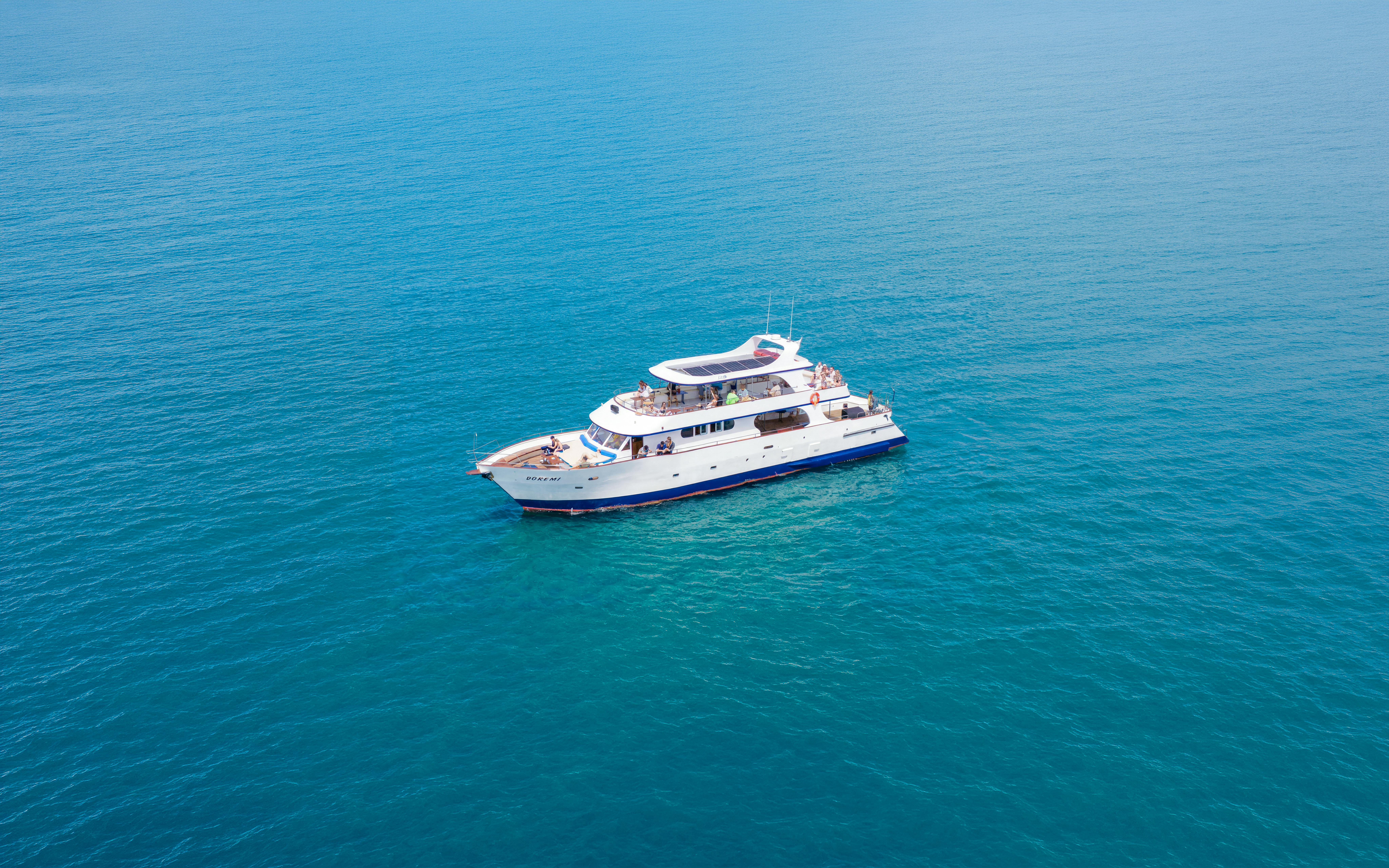 Cruise boat on clear blue waters near Larnaca for snorkeling tour.