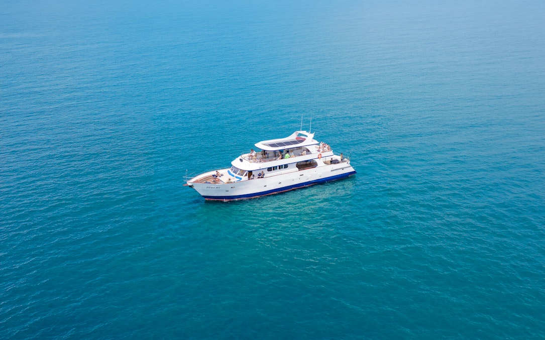 Cruise boat on clear blue waters near Larnaca for snorkeling tour.