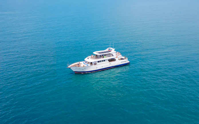 Cruise boat on clear blue waters near Larnaca for snorkeling tour.