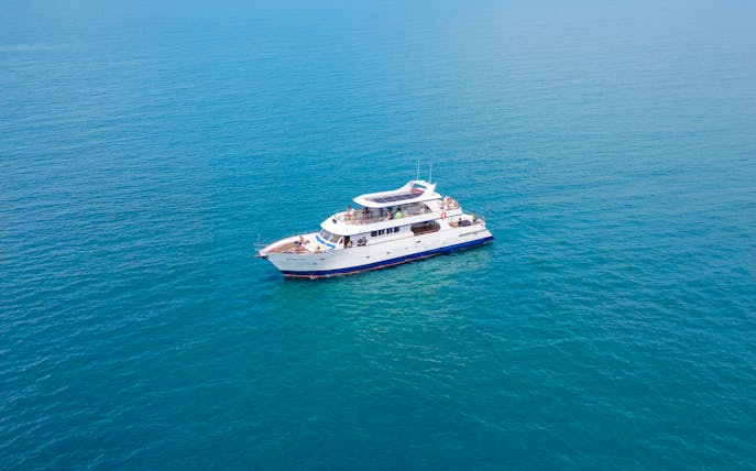 Cruise boat on clear blue waters near Larnaca for snorkeling tour.