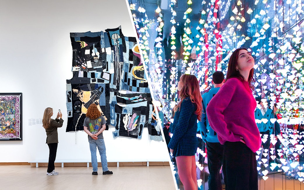 Visitors viewing modern art installations at Stedelijk Museum Amsterdam.