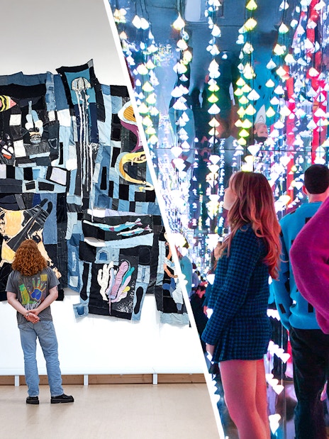 Visitors viewing modern art installations at Stedelijk Museum Amsterdam.