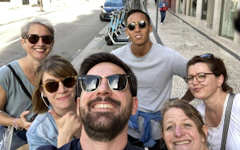 Group enjoying Porto’s Old Town exploration game on a sunny street.