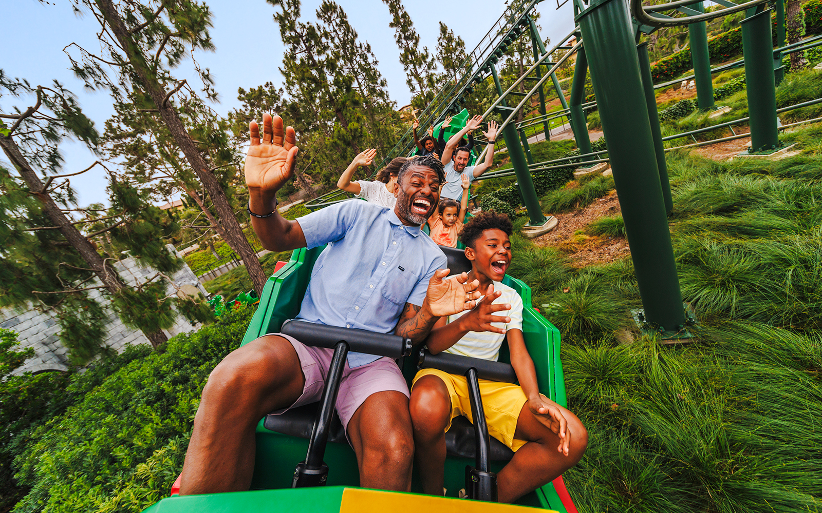 Family enjoying a rollercoaster ride at LEGOLAND California.