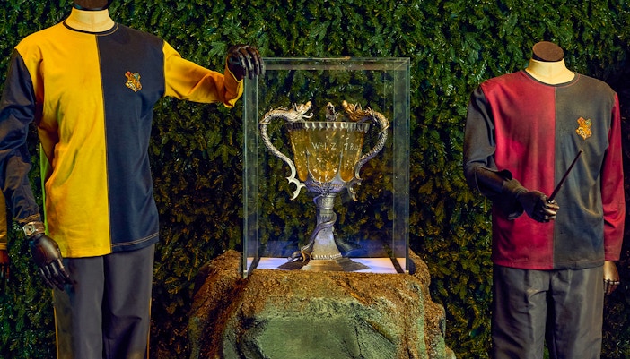 Triwizard Tournament set at Warner Bros. Studio Tour London with dragon prop and Hogwarts backdrop.