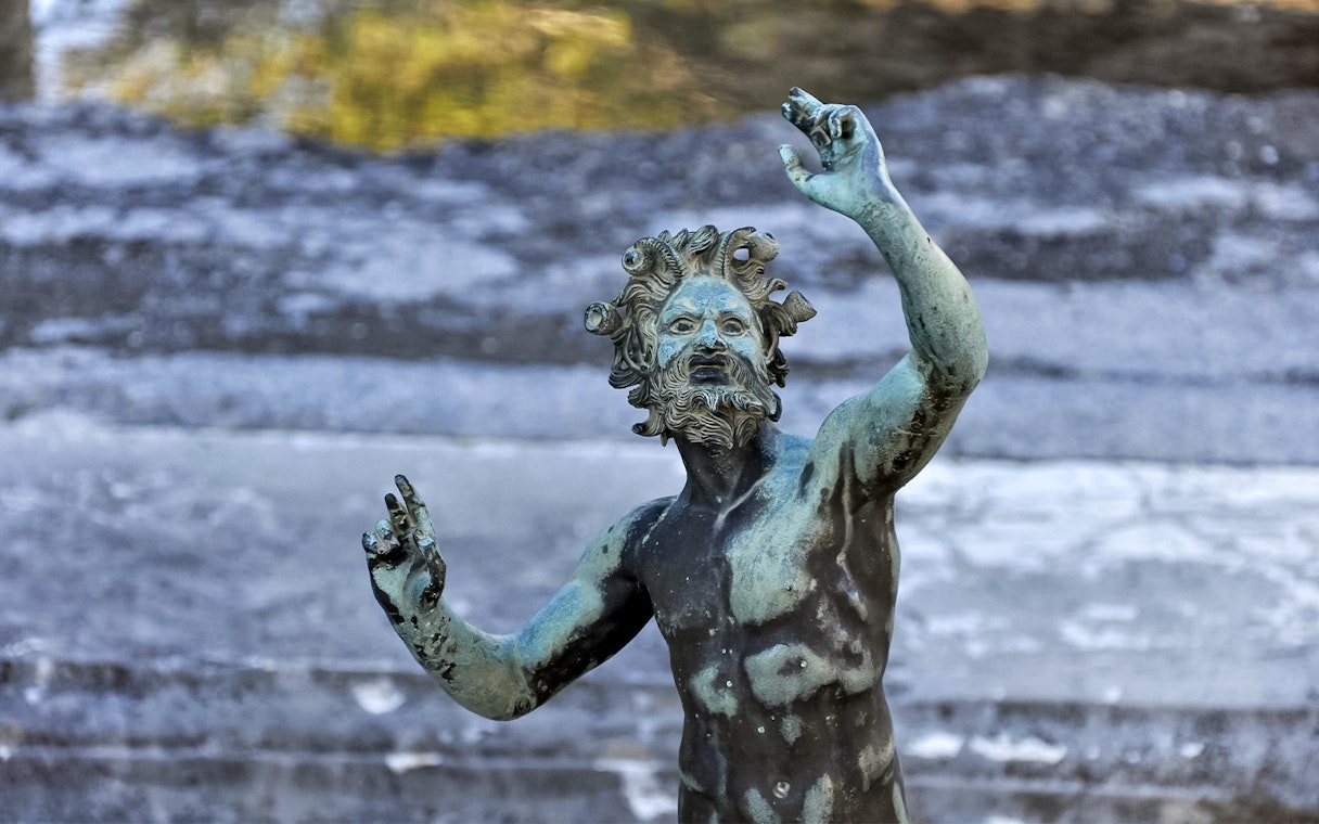 Ancient bronze statue in Herculaneum, part of the Vesuvius and Herculaneum tour.