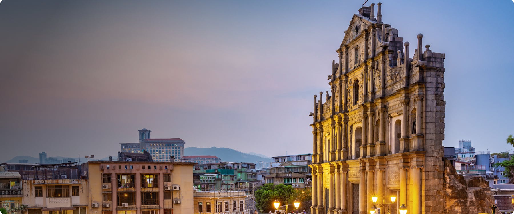 Ruins of St. Paul's facade in Macau at sunset.