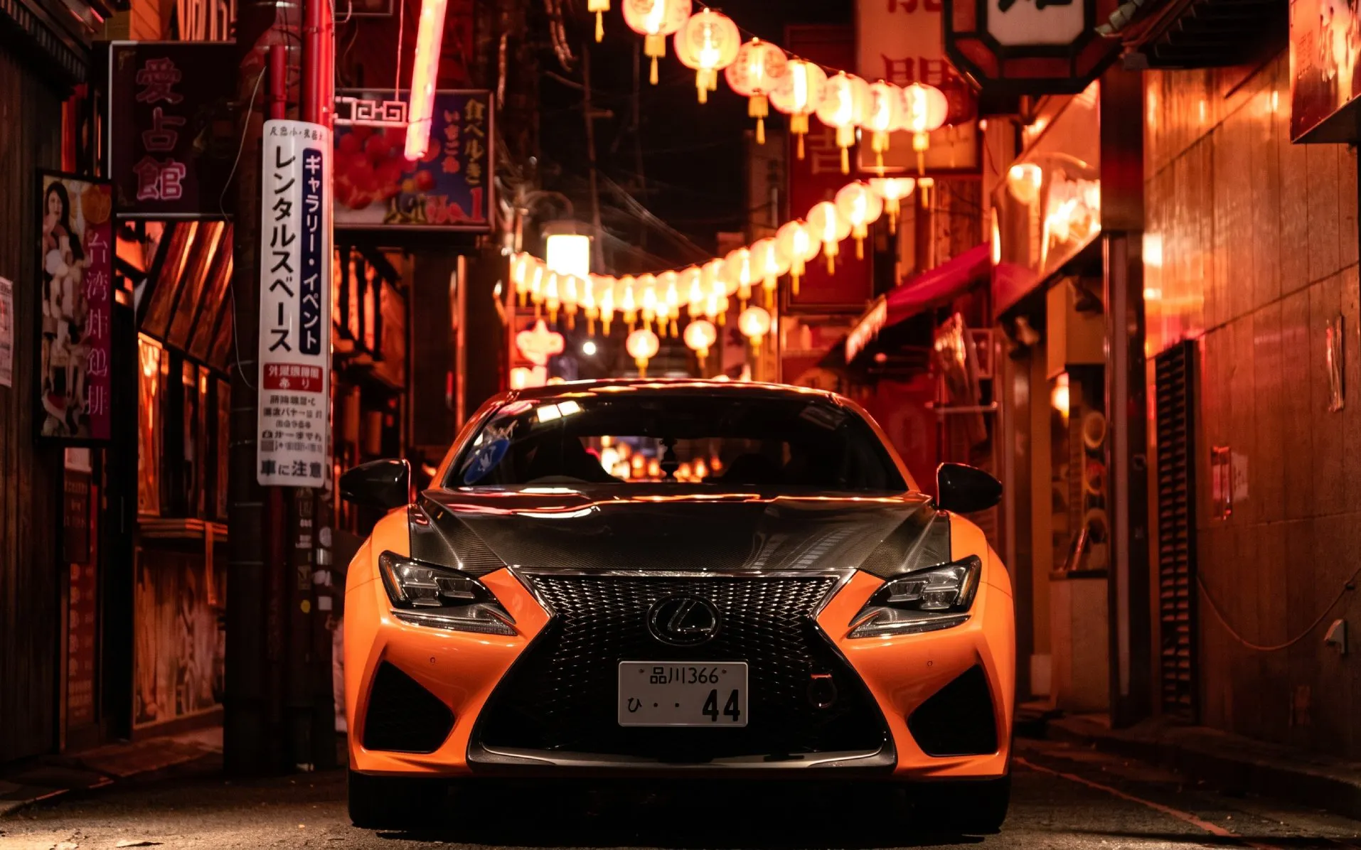Sports car in Tokyo's Daikoku PA, illuminated by lanterns, Fast & Furious 3 meet.