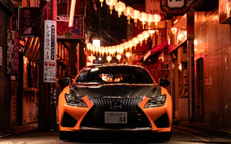 Sports car in Tokyo's Daikoku PA, illuminated by lanterns, Fast & Furious 3 meet.