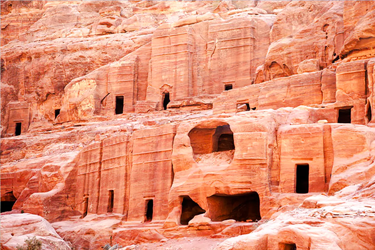 Ancient rock-cut architecture at Little Petra, Jordan, seen on a guided tour from Amman.