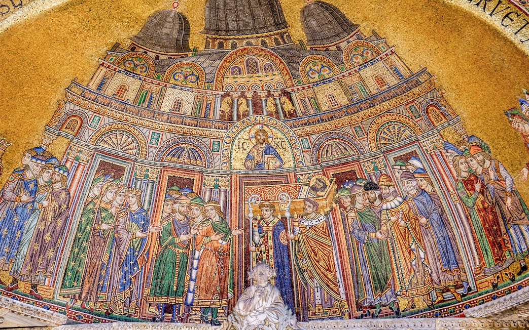 Mosaic depicting religious figures and architecture in St. Mark's Basilica, Venice.
