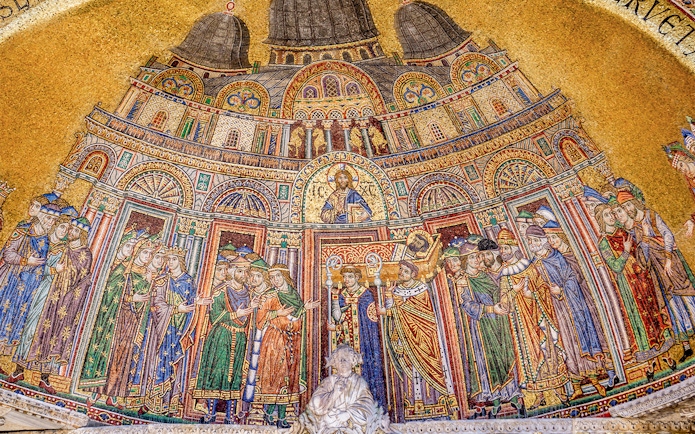 Mosaic depicting religious figures and architecture in St. Mark's Basilica, Venice.