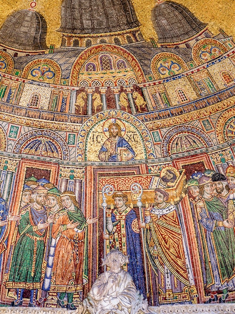 Mosaic depicting religious figures and architecture in St. Mark's Basilica, Venice.