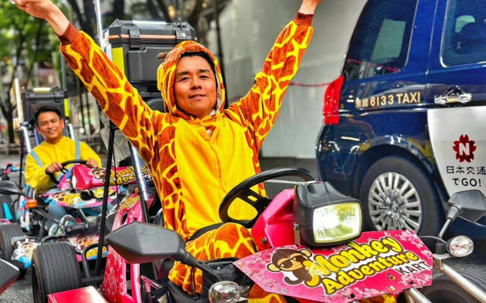 Go-kart riders in costume during Dotonbori & Shinsaibashi 75-min go-karting experience.