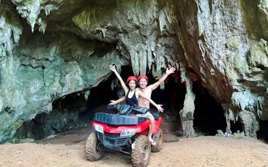 Kayaking and ATV adventure in Krabi cave setting.