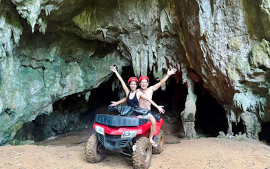 Kayaking and ATV adventure in Krabi cave setting.