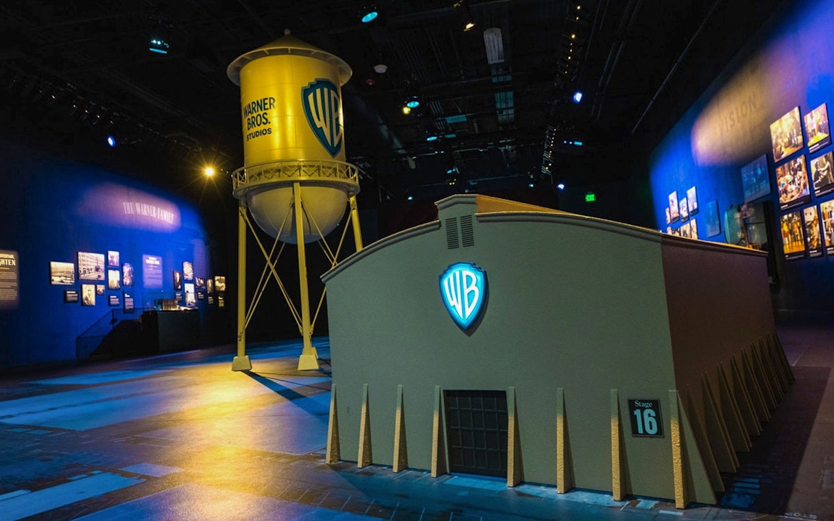 Warner Bros Studio Tour Hollywood interior with iconic water tower and Stage 16 building.
