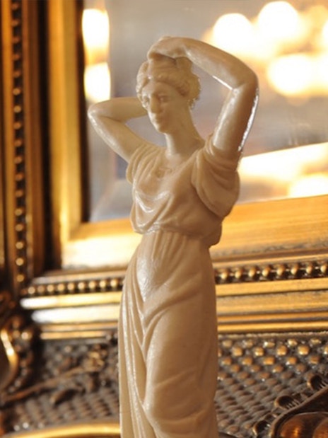 Elegant statue detail at Evening Chopin Piano Concert venue.