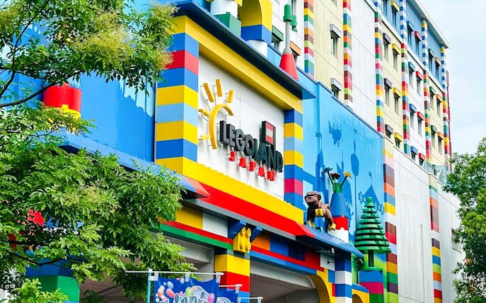 Entrance of Legoland Japan with colorful Lego-themed facade.