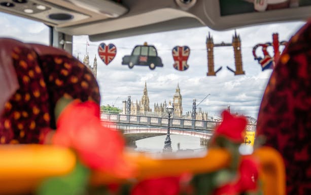 View of Big Ben and Westminster from inside a London sightseeing bus.