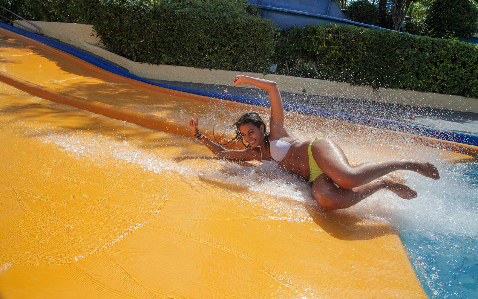 Children playing on water slides at AquaPark Costa Teguise, Lanzarote.