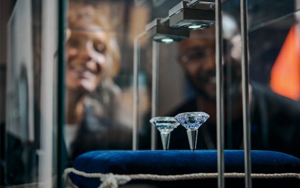 Guests viewing diamonds at Royal Coster Diamond Experience, Amsterdam.