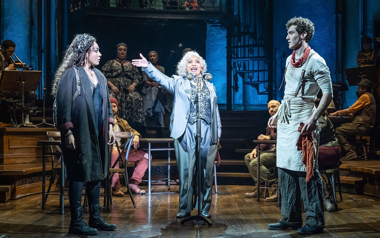 Performers on stage during Hadestown musical.