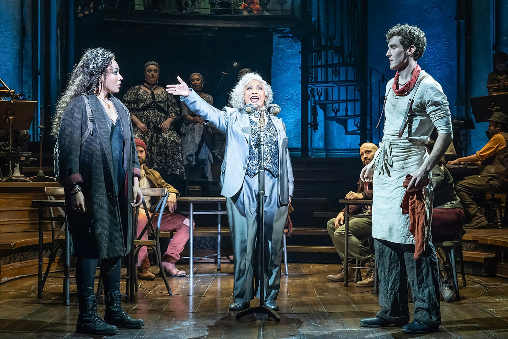 Performers on stage during Hadestown musical.