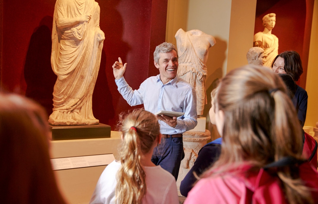 Visitors exploring exhibits on a private tour at the Metropolitan Museum of Art, New York, with skip-the-line access.