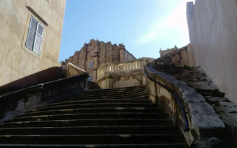 Jesuit Stairs leading to a historic building in Dubrovnik Old Town.