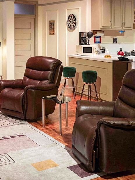Living room set from The FRIENDS™ Experience with iconic furniture and decor.