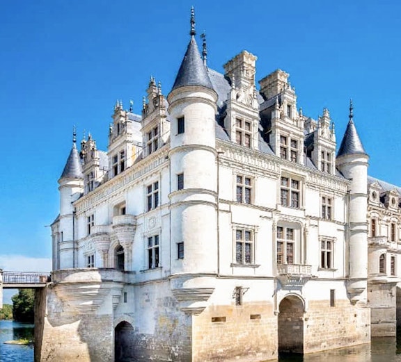 Loire Valley's Château de Chenonceau over river, Paris tour destination.