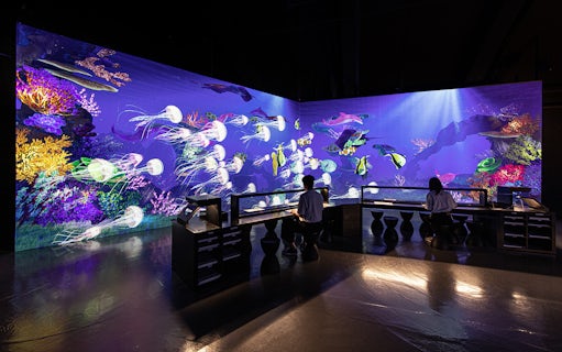 Live sketch exhibit at ARTE Museum Dubai featuring vibrant underwater scene.