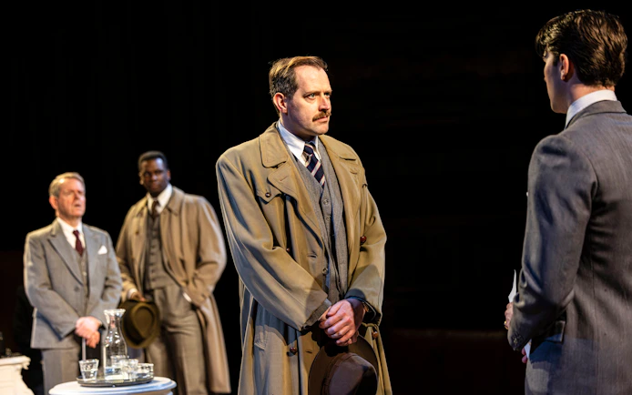 Actors in courtroom scene from "Witness for the Prosecution" performance.