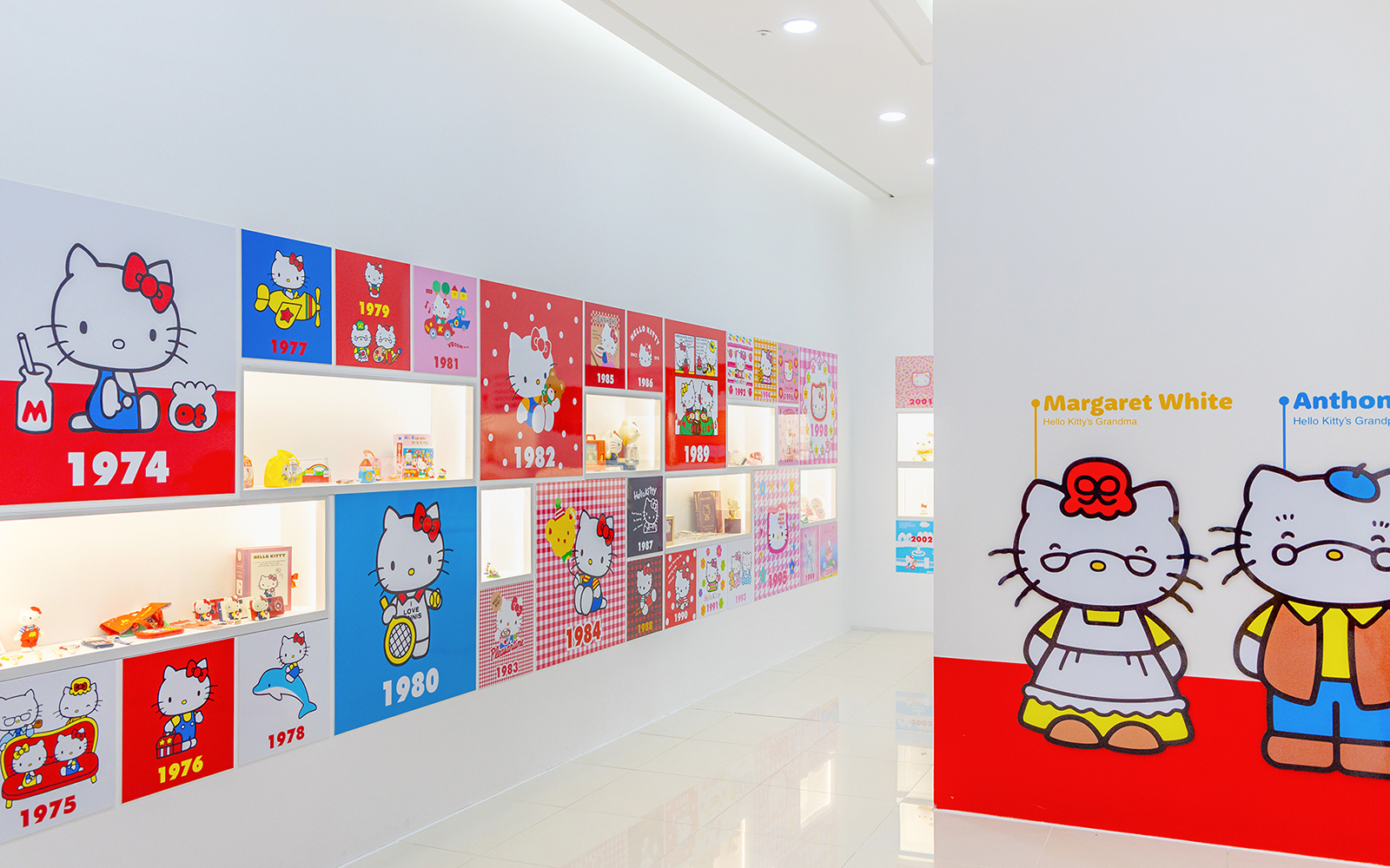 Hello Kitty Island interior with character timeline and memorabilia display.