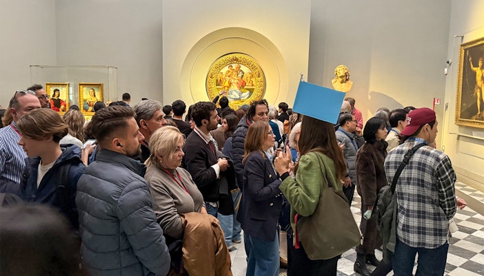 Visitors viewing art exhibits during a private tour at the Uffizi Gallery, Florence.