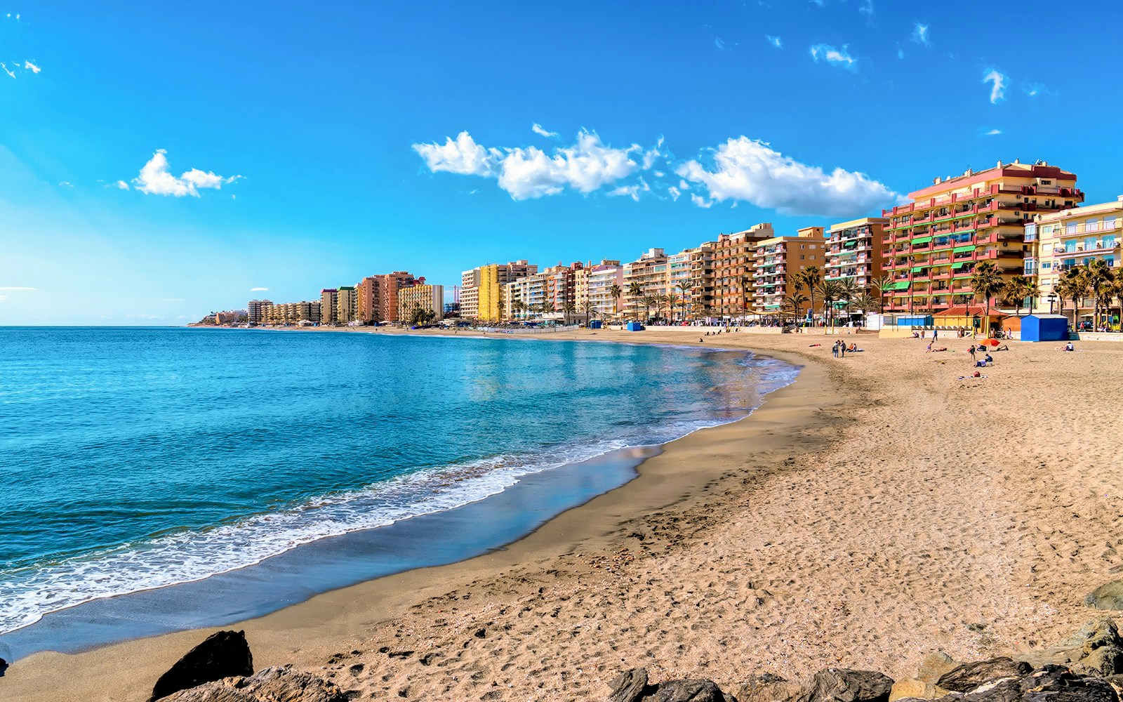 Fuengirola beach with Mediterranean blue sea in Malaga province, Costa del Sol, Spain.