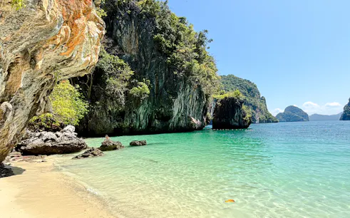 Hong Islands limestone cliffs and turquoise water, Krabi speedboat tour.