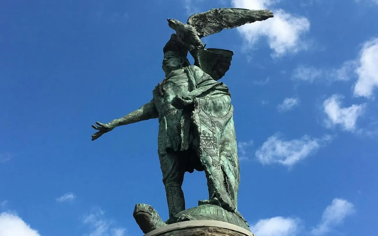 Statue of Native American with eagle in Philadelphia Old Town.