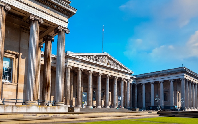 The British Museum's neoclassical facade with columns in London, UK.