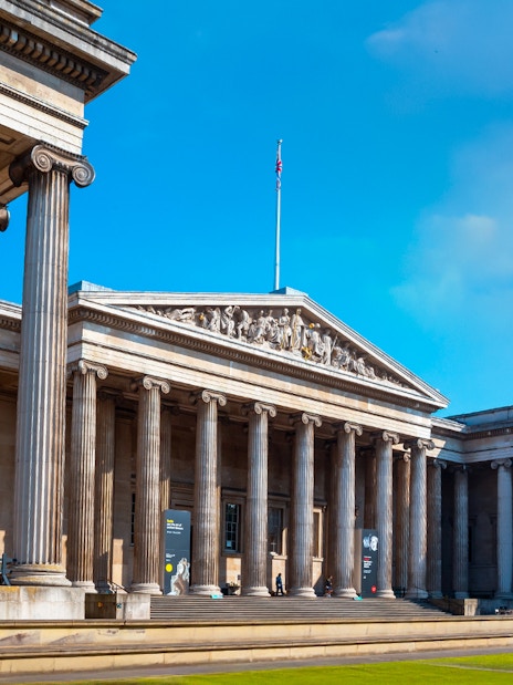 The British Museum's neoclassical facade with columns in London, UK.