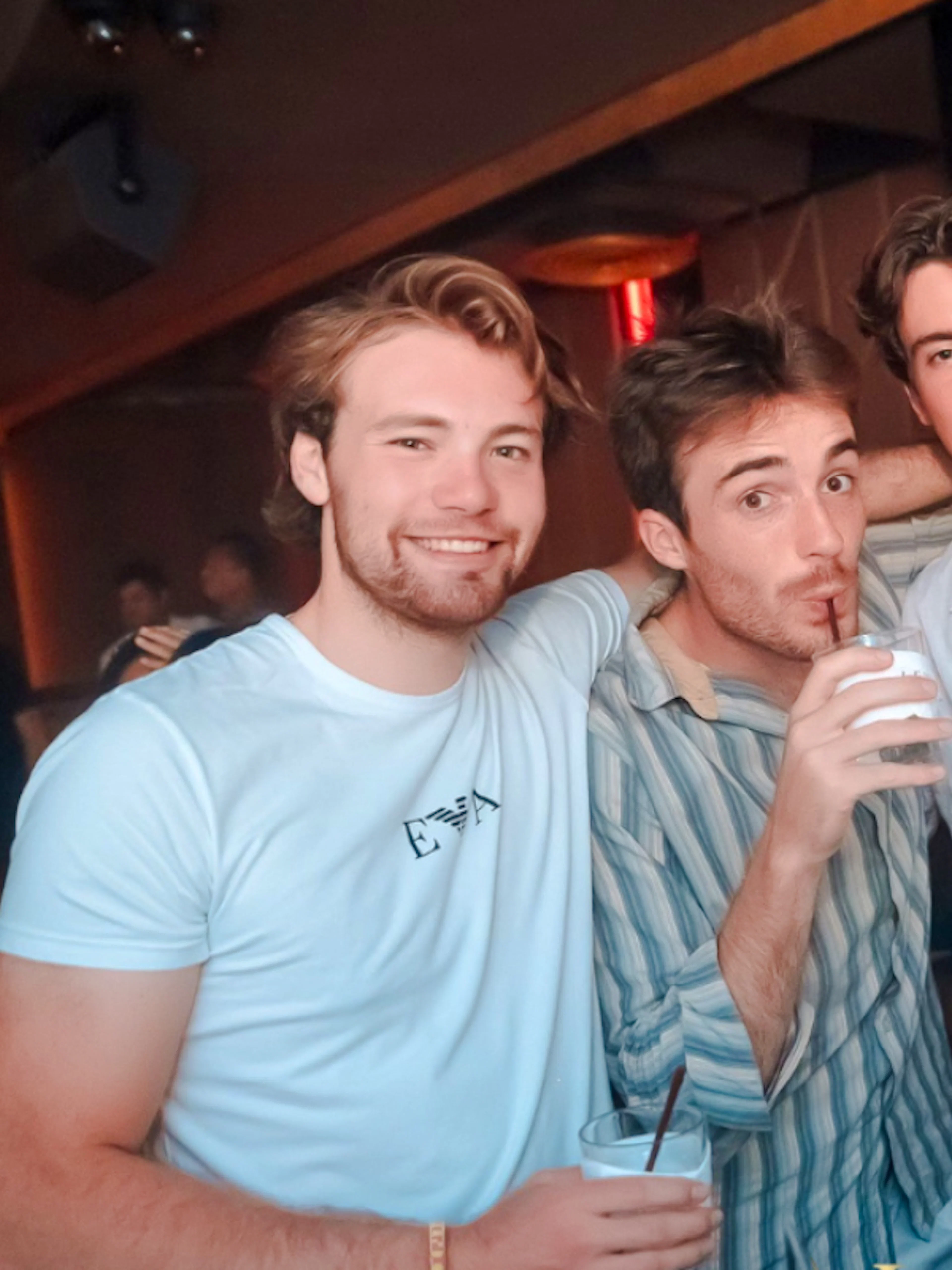 Group enjoying Bangkok rooftop pub crawl experience.