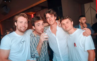 Group enjoying Bangkok rooftop pub crawl experience.