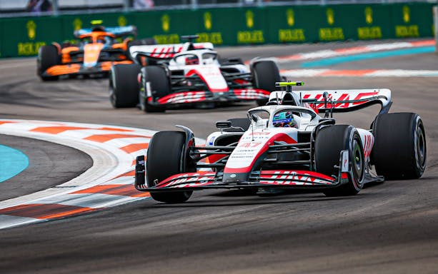 Race cars on track at Formula 1 Miami Grand Prix.
