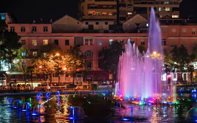Tirana Pub Crawl: Guided Nightlife Tour with Entry to Three Venues, Welcome Drinks, and DJ Entertainment