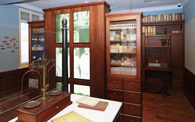 Eagle Pharmacy interior with historical artifacts in Krakow, part of guided tour to Auschwitz-Birkenau.