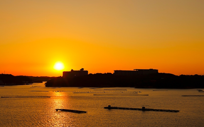 Sunset view over a river in Japan, visible from Kintetsu Rail Pass route.