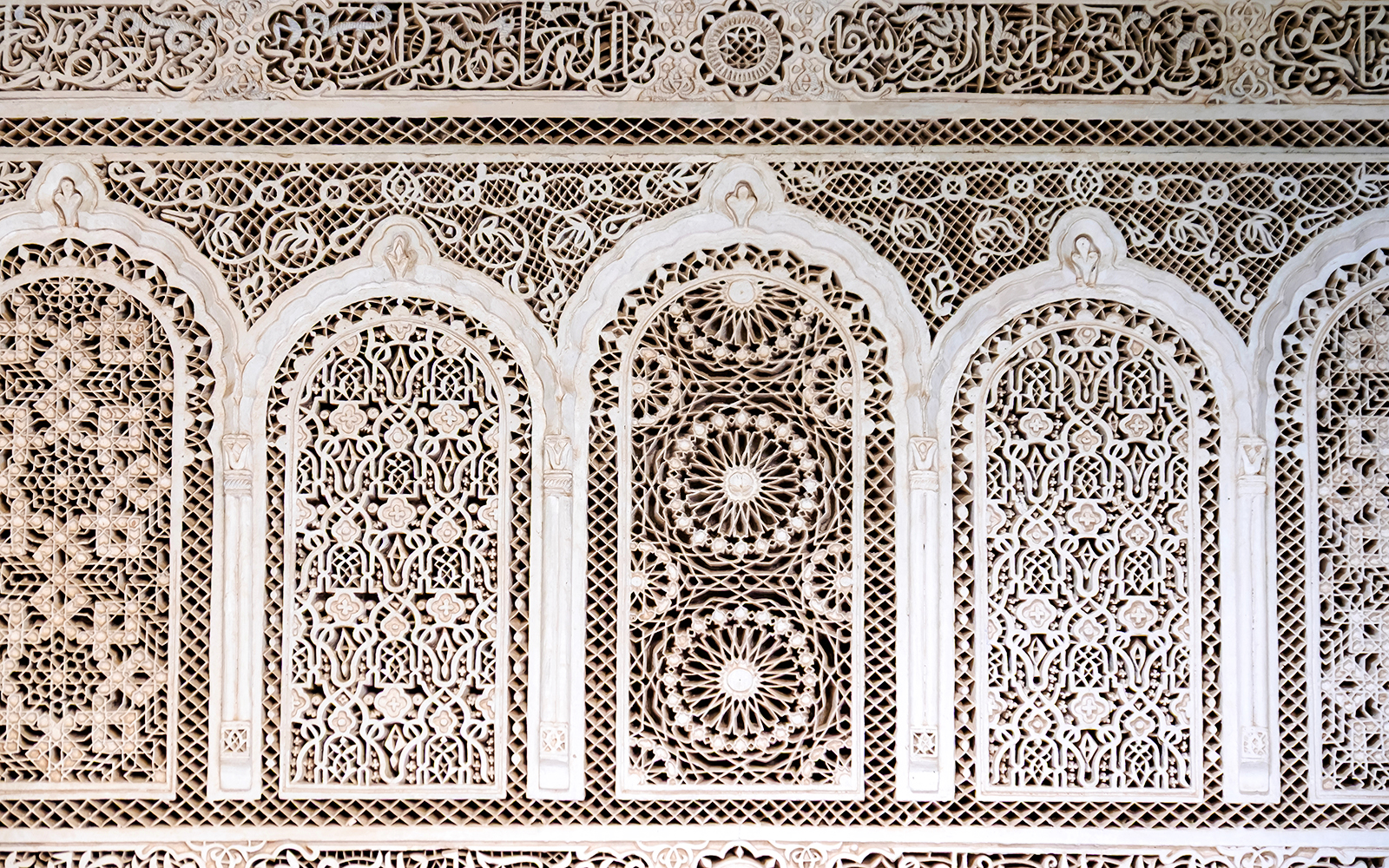 Intricate tile patterns in Bahia Palace, Marrakech, Morocco.