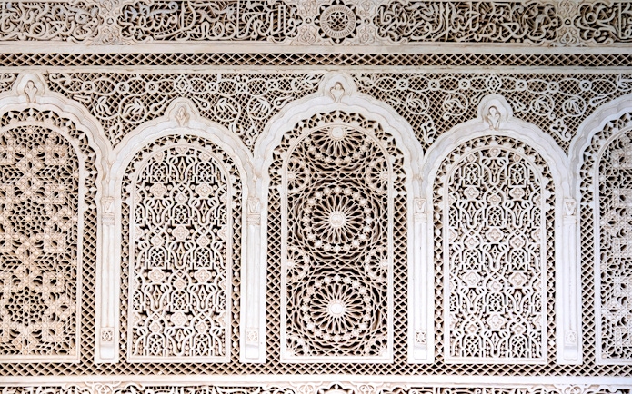 Intricate tile patterns in Bahia Palace, Marrakech, Morocco.