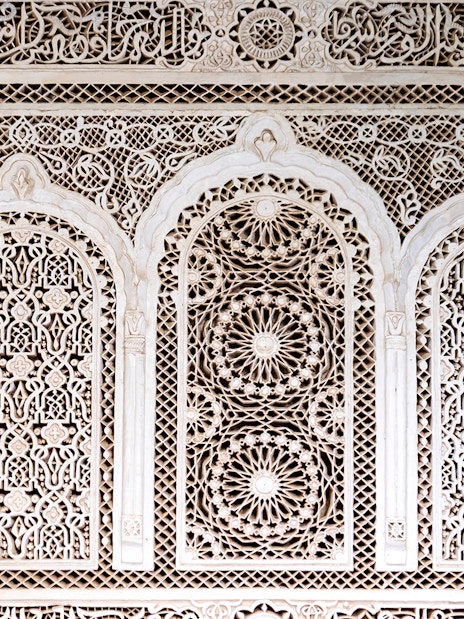 Intricate tile patterns in Bahia Palace, Marrakech, Morocco.
